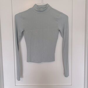 Light blue long sleeve mock neck shirt